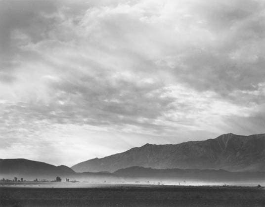 October 11, 2020, Manzanar, California, USA: Dust Storm at base of Mountain on Cloudy Day, View from Manzanar Relocation Center, Manzanar, California, USA, Ansel Adams, Manzanar War Relocation Center photographs, 1943 Manzanar USA - ZUMAg145 20201011_zza_g145_003 Copyright: xJTxVintagex