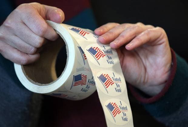 WASHINGTON, D.C., USA - NOVEMBER 3, 2020: A coil of stickers to hand out to voters at a polling station at the Union Market building during the 2020 general elections. The USA elect a president and vice president, 35 Senators, all 435 members of the House of Representatives, 13 governors of 11 states and two US territories, as well as state and local government officials. Incumbent Republican President Donald Trump and Democratic Party nominee Joe Biden are running for president. Yegor Aleyev TASS  TS0ED051