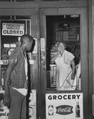 Mrs. Anna Kelter, 67, looks in horror at damage done by rioters to her store after night of rioting due to fatal shooting of Teen James Powell by Police Officer Lt. Thomas Gilligan, 551 Nostrand Avenue, Brooklyn, New York, USA, Stanley Wolfson, World Telegram & Sun, July 21, 1964 Copyright: xCircaxImagesx ghi-circa08792