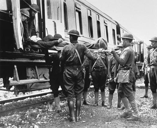 Group of Soldiers carrying Wounded Men aboard Hospital Train, Herouville, France, U.S. Army Signal Corps, April 27, 1918  Copyright: xCircaxImagesx ghi-circa09057