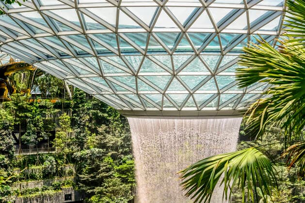 The Jewel Changi Airport in Singapore, a mixed use development complex featuring a rain vortex, the largest indoor waterfall in the world in 2019.  Copyright: xSiyuanxMax