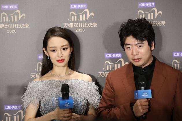 Chinese concert pianist Lang Lang, right, and his wife Gina Alice Redlinger, left, are interviewed prior to the 2020 Tmall Double 11 Gala, which is held to celebrate the Double 11, a shopping festival established by Alibaba Group, Shanghai, China, 10 November 2020.