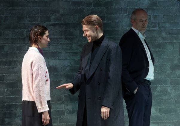 MOSCOW, RUSSIA - NOVEMBER 10, 2020: Actress Vasilisa Perelygina, actors Nikita Yefremov and Vladimir Khrabrov (L-R) in a scene from a theater production of Fyodor Dostoyevsky s novel Demons staged by director Konstantin Bogomolov at the Palace on the Yauza theater and concert hall. Sergei Fadeichev TASS  TS0EDC85