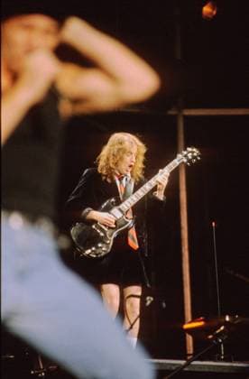 24 August 1991 --- Guitarist Angus Young of Australian band AC DC performing live in concert at the Monsters Of Rock festival at Galopprennbahn Riem in Munich, Germany, 24 August 1991 - - - --- - - - Photo: Hans-Martin Issler --- AC DC live