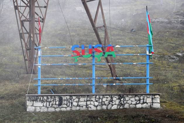 SHUSHI DISTRICT, AZERBAIJAN - NOVEMBER 18, 2020: A directional sign by a peacekeepers outpost near the city of Shushi. The fighting between Armenia and Azerbaijan over the disputed Caucasus Mountains territory of Nagorno-Karabakh resumed in late September; on November 10, Armeniaâ€™s Prime Minister Nikol Pashinyan, Russiaâ€™s President Vladimir Putin, and Azerbaijanâ€™s President Ilham Aliyev signed a joint statement on a complete ceasefire in Nagorno-Karabakh. Stanislav Krasilnikov TASS  TS0EEA5E
