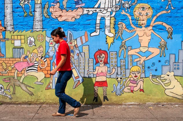 Street art and graffitis in San Antonio of Cali in the Cauca Valley, Colombia, South America. Street Art or Graffiti was a crime in Colombia until 2011 following the death of 16 year old, Diego Felipe Becerra who was shot by police whilst he was creating his signature image of Felix the cat. Gustavo Petro, then mayor of Bogota, issued a decree to decriminalise graffiti and street art painting to help promote what was seen as a new form of artistic and cultural expression, but with the agreement that certain areas should remain free from graffiti, such as public buildings and monuments. This area is known as La Candelaria set in the most popular museums and attractions. The neighborhood is an eclectic juxtaposition between old and new, hi Copyright: xSergixReboredox SRE-CG1196