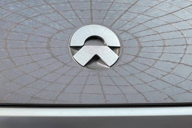 BEIJING, CHINA - NOVEMBER 29: A NIO logo is seen on a NIO electric vehicle at an automotive experience area of Wanda Plaza on November 29, 2020 in Beijing, China.  Copyright: xVCGx CFP111308905900