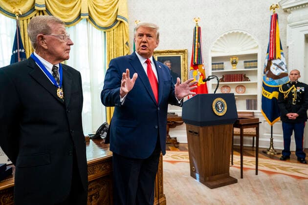 December 3, 2020, Washington, District of Columbia, USA: United States President Donald J. Trump makes remarks to the media about the election and the Attorney General after presenting the Medal of Freedom to Lou Holtz, in the in the Oval Office of the White House in Washington, DC, Thursday, December 3, 2020. Standing at left is Lou Holtz Washington USA - ZUMAs152 20201203_zaa_s152_003 Copyright: xDougxMillsx