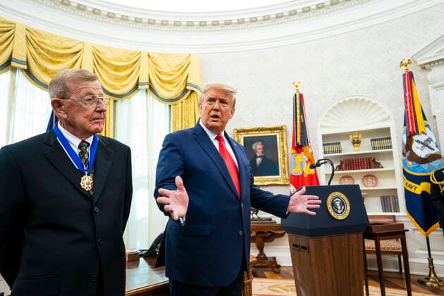 United States President Donald J. Trump makes remarks to the media about the election and the Attorney General after presenting the Medal of Freedom to Lou Holtz, in the in the Oval Office of the White House in Washington, DC, Thursday, December 3, 2020. Standing at left is Lou Holtz. Copyright: xDougxMillsx-xPoolxviaxCNPx MediaPunchx