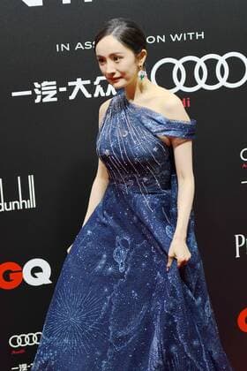 Chinese actress and singer Yang Mi shows up in blue dress, showing off her elegance at the red carpet for the GQ Men of The Year 2020, Shanghai, China, 4 December 2020.