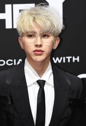 Chinese singer-songwriter, dancer, actor and rapper Cai Xukun, better known by the mononym Kun, shows up in black suit with white hair, showing off his elegance at the red carpet for the GQ Men of The Year 2020, Shanghai, China, 4 December 2020.