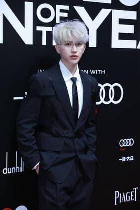 Chinese singer-songwriter, dancer, actor and rapper Cai Xukun, better known by the mononym Kun, shows up in black suit with white hair, showing off his elegance at the red carpet for the GQ Men of The Year 2020, Shanghai, China, 4 December 2020.