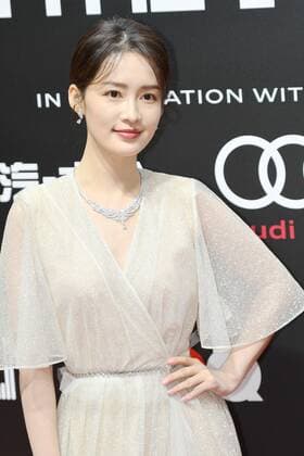 Chinese actress Li Qin, also known as Sweet Li, shows up in white dress, showing off her elegance at the red carpet for the GQ Men of The Year 2020, Shanghai, China, 4 December 2020.