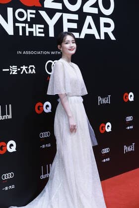 December 4, 2020, Shanghai, China: Chinese actress Li Qin, also known as Sweet Li, shows up in white dress, showing off her elegance at the red carpet for the GQ Men of The Year 2020, Shanghai, China, 4 December 2020.