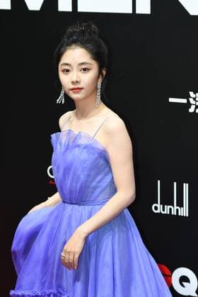 Chinese actress Tan Songyun shows up in blue dress, showing her beauty and cuteness at the red carpet for the GQ Men of The Year 2020, Shanghai, China, 4 December 2020.