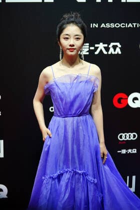 Chinese actress Tan Songyun shows up in blue dress, showing her beauty and cuteness at the red carpet for the GQ Men of The Year 2020, Shanghai, China, 4 December 2020.