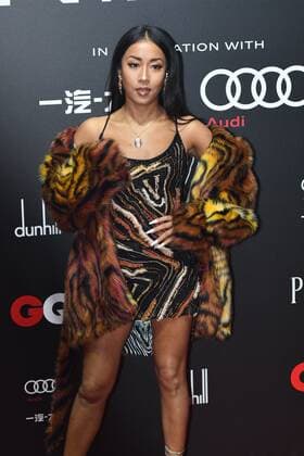 Chinese singer and actress Jike Junyi shows up in leopard-print dress, showing off her beauty and great body shape, at the red carpet for the GQ Men of The Year 2020, Shanghai, China, 4 December 2020.
