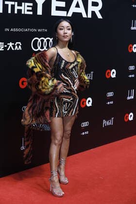 Chinese singer and actress Jike Junyi shows up in leopard-print dress, showing off her beauty and great body shape, at the red carpet for the GQ Men of The Year 2020, Shanghai, China, 4 December 2020.