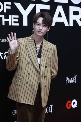 Chinese-Taiwanese singer, rapper and actor Lin Yanjun, a member of temporary Chinese boy group Nine Percent, shows up in striped suit at the red carpet for the GQ Men of The Year 2020, Shanghai, China, 4 December 2020.