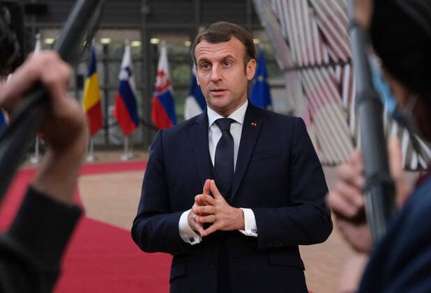 (201211) -- BRUSSELS, Dec. 11, 2020 () -- French President Emmanuel Macron arrives for the EU summit in Brussels, Belgium, on Dec. 10, 2020. The leaders of the 27 European Union (EU) member states on Thursday reached an agreement on the EU long-term budget and recovery fund, paving way for the implementation of the recovery package totaling over 1.8 trillion euros (2.19 trillion U.S. dollars) to tackle the socio-economic consequences of COVID-19 pandemic. (European Union Handout via ) BELGIUM-BRUSSELS-EU-SUMMIT Xinhua 