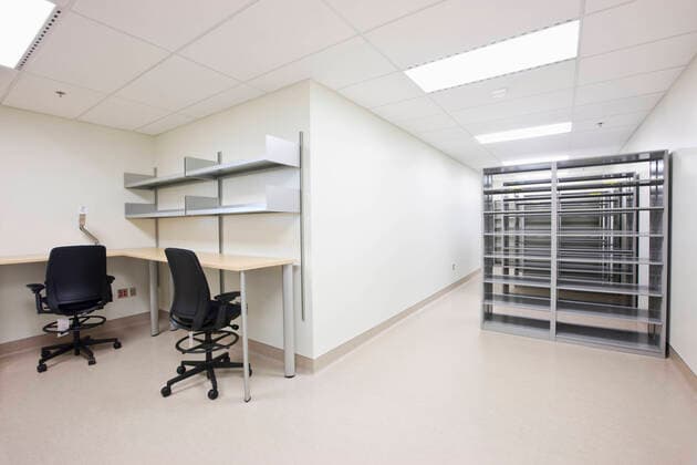 Empty office with desks chairs and server towers. Empty office with desks chairs and server towers.  Empty office with desks chairs and server towers.