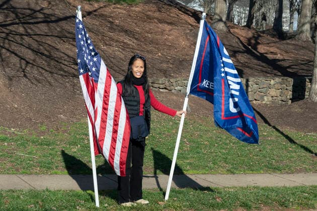 December 13, 2020, Sterling, Virginia, USA: A demonstrator shows support for United States President Donald J. Trump as he arrives at Trump National Golf Club in Sterling, VA, December 13, 2020. Credit: Pool via CNP Sterling USA - ZUMAs152 20201213_zaa_s152_006 Copyright: xChrisxKleponisx