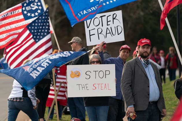 December 13, 2020, Sterling, Virginia, USA: Protesters demonstrate as United States President Donald J. Trump visits Trump National Golf Club in Sterling, VA, December 13, 2020. Credit: Pool via CNP Sterling USA - ZUMAs152 20201213_zaa_s152_012 Copyright: xChrisxKleponisx