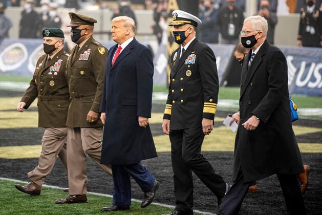 United States of America: U.S. President Donald Trump walks out for the coin toss to start the 121st Army-Navy football game at Michie Stadium December 12, 2019 in West Point, New York. Walking alongside the president are left to right: Chairman of the Joint Chiefs Gen. Mark Milley, Lt. Gen. Darryl Williams, Superintendent of the U.S. Military Academy, Adm. Sean Buck, Superintendent of the U.S. Naval Academy and Acting Defense Secretary Christopher Miller. West Point United States of America - ZUMAp138 20201212_zaa_p138_006 Copyright: xGabriellexHall U.S.xArmyx