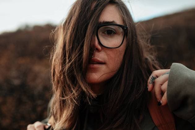Woman looking at camera in countryside, Model released Copyright: xAdrianxSavax MR