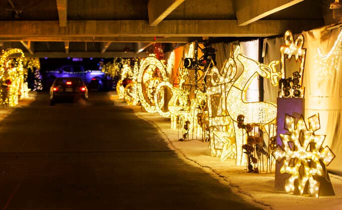 (201216) -- TORONTO, Dec. 16, 2020 -- Christmas decorations and lights are seen as visitors drive their cars to a drive-thru Christmas-themed light show Polar Drive in Toronto, Canada, Dec. 15, 2020. (Photo by Xinhua) CANADA-TORONTO-COVID-19-DRIVE-THRU-LIGHT SHOW ZouxZheng 