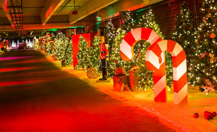 (201216) -- TORONTO, Dec. 16, 2020 -- Christmas decorations and lights are seen as visitors drive their cars to a drive-thru Christmas-themed light show Polar Drive in Toronto, Canada, Dec. 15, 2020. (Photo by Xinhua) CANADA-TORONTO-COVID-19-DRIVE-THRU-LIGHT SHOW ZouxZheng 