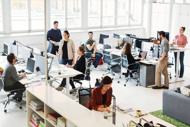 High angle view of business people working in modern office , model released Copyright: xMaskotx , MA46693