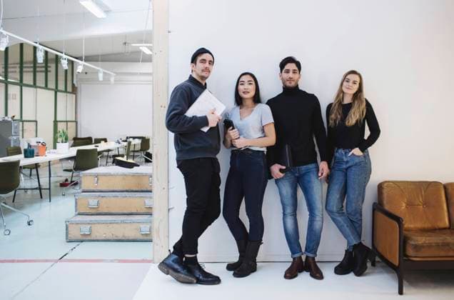 Full length portrait of confident entrepreneurs standing in creative office , model released, property released Copyright: xMaskotx , MA54409