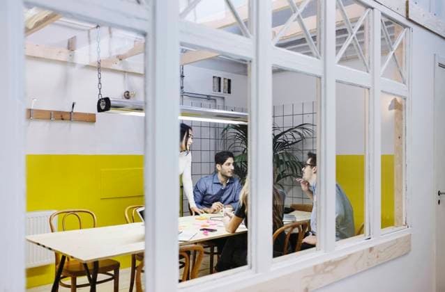 Four people discussing in board room at creative office , model released, property released Copyright: xMaskotx , MA54481