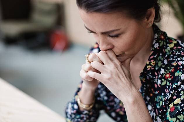 Close-up of tired thoughtful businesswoman with arms crossed at office , model released, property released Copyright: xMaskotx , MA63031