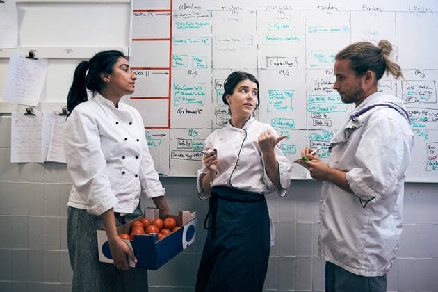Chefs communicating against whiteboard in kitchen , model released, property released Copyright: xMaskotx , MA64561