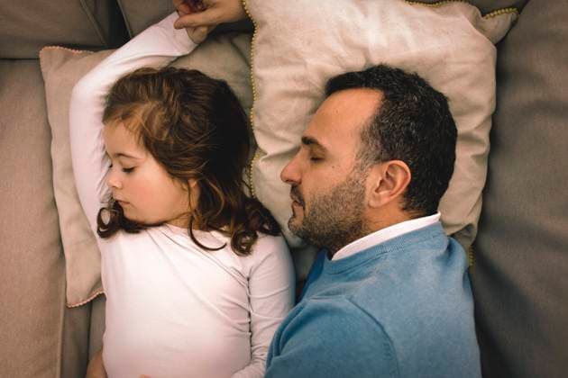 Directly above shot of father and daughter napping on couch at home , model released, property released Copyright: xMaskotx , MA69015