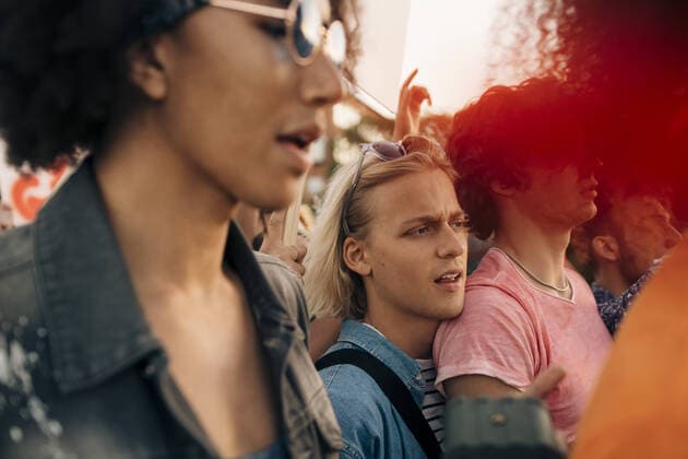 IMAGO Creative: Pride Month 2022, Aktivismus Men protesting while marching in city , model released Copyright: xMaskotx , MA69832