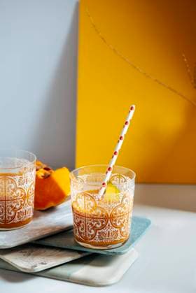 Mango and pumping smoothie on a glass. Surrounded by fruits and vegetables, healthy life concept, Model released, Property released Copyright: xJayxMidx MR