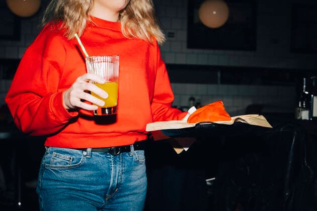 Midsection of female waitress with food and drink in restaurant Sweden, Stockholm, model released, property released Copyright: xMaskotx , MA79650