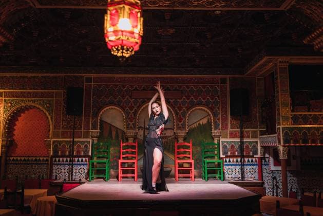 Young lady in dress dancing flamenco on scene in luxury oriental room decorated by mosaic, Model released, Property released Copyright: xKikexArnaizx MR