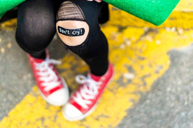 Close-up of band-aid on girl s injured knee model released Symbolfoto ERRF01042