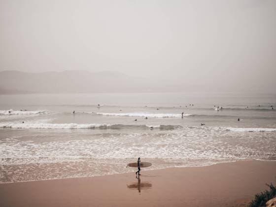 People surfing in ocean, Model released Copyright: xAdrianxCanox MR