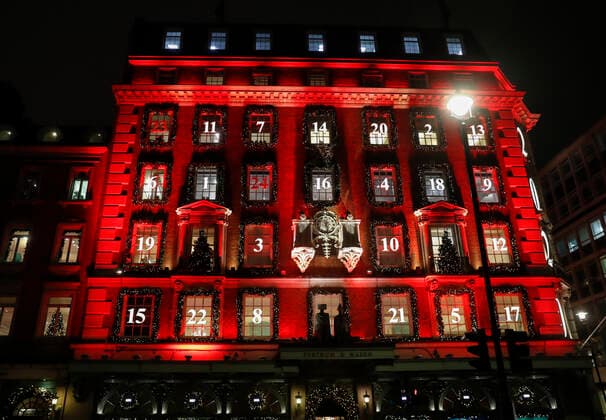 (201223) -- LONDON, Dec. 23, 2020 -- The facade of the Fortnum and Mason food store is seen decorated in the style of an Advent calendar in London, Britain, Dec. 22, 2020. ) BRITAIN-LONDON-BUILDING-ADVENT CALENDAR HanxYan 