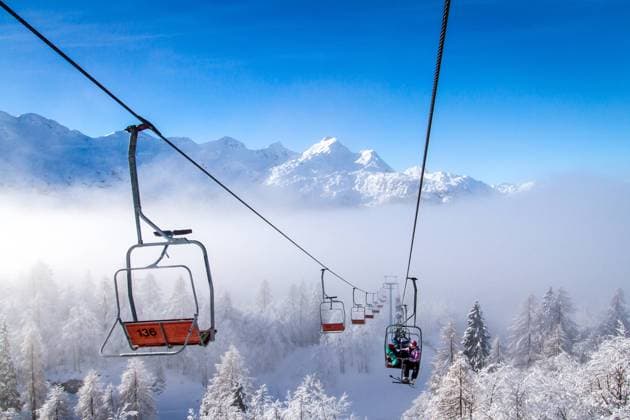 Ski lifts at Vogel ski center, Slovenia. Winter mountains panorama with ski slopes and ski lifts at Vogel ski center, Slovenia.vogel, slovenia, snow, ski lift, ski, lift, alps, mountains, resort, forest, cold, holiday, landscape, nature, peak, tourism, outdoor, sport, white, winter, cloud, downhill, elevator, fir, hill, pine, sky, snowy, travel, triglav, blue, lifestyle, transportation, bohinj, recreation, vacation, cable, cableway, chair, chairlift, skilift, leisure, line, ride, wintersport, slope, mountainside, skier, people, Julian Alps,  Copyright: xPeterxKastelicx 22516050