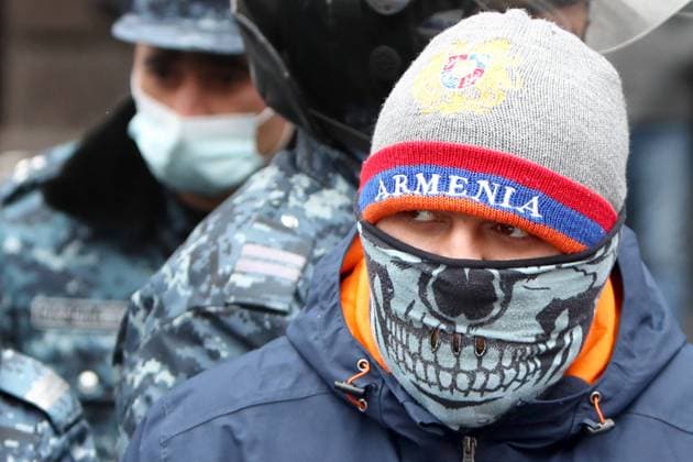 YEREVAN, ARMENIA - DECEMBER 24, 2020: A man takes part in a protest outside the House of the Government demanding the resignation of Armenia s Prime Minister Nikol Pashinyan. On 9 November, Armenia s Prime Minister Nikol Pashinyan, Russia s President Vladimir Putin and Azerbaijan s President Ilham Aliyev signed an agreement on a complete ceasefire in the disputed Caucasus region of Nagorno-Karabakh, sparking mass protests in Armenia. Vahram Baghdasaryan Photolure TASS  TS0F2AB5
