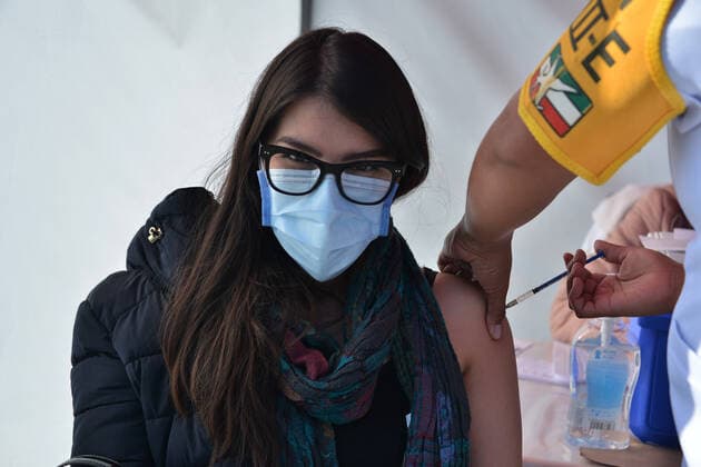 Vaccination Against Covid-19 In Mexico MEXICO CITY, MEXICO - DECEMBER 30: A nurse administrates the Pfizer-BioNTech COVID-19 vaccine to a person during the vaccinations against Covid for health workers at tents installed for the vaccination campaign of Covid-19 inside Military Camp 1A on December 30, 2020 in Mexico City, Mexico Copyright: xCarlosxTischlerx EYEPIXGROUP_CT_30122020_3131
