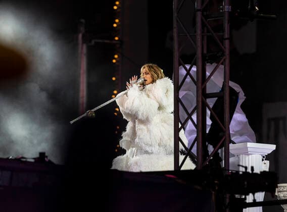2021 New Year celebration on Times Square Jennifer Lopez performs on stage during 2021 New Year celebration on Times Square. Because of COVID-19 pandemic no revelers were allowed to be on Times Square, only few essential workers received special invitations and were seated inside socially distanced pods. New York New York United States Copyright: LevxRadin