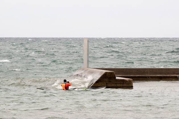 January 1, 2021, Toronto, Ontario, Canada: A winter kayaker takes in the the sight of a second mysterious metal monolith off Torontos shoreline New Years Day. The structure was anonymously and strategically placed on the breakwall in the early hours of 2021 in direct line of sight of a first column which appeared nearby 24 hours earlier. Toronto Canada - ZUMAs109 20210101_zaf_s109_008 Copyright: xChristopherxDrostx
