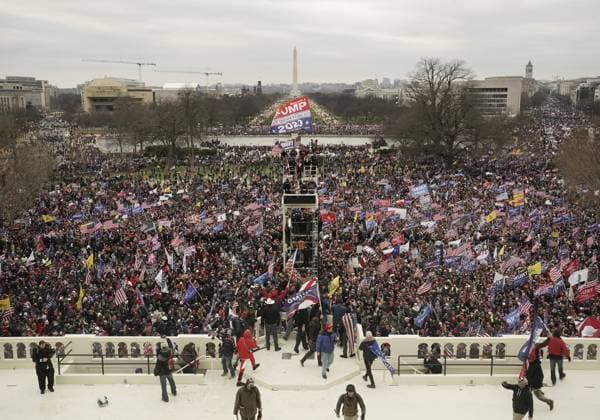 Pro-Trump rioters breach the security perimeter and penetrate the U.S. Capitol to protest against the Electoral College vote count that would certify President-elect Joe Biden as the winner in Washington, DC on Wednesday, January 6, 2021. Under federal law, Jan. 6 is the date Electoral College votes determining the next president are counted in a joint session of Congress.  WAP2021010558 KenxCedeno